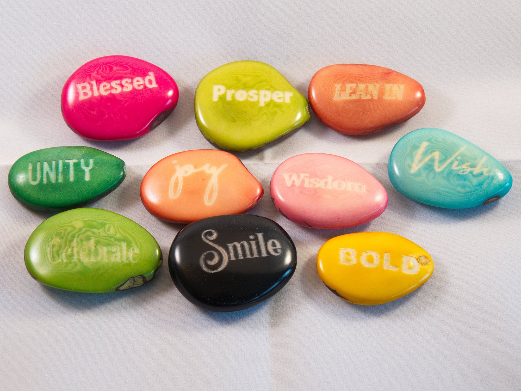 Seeds of Wisdom - Words carved in Tagua Nut from Ecuador (IS)